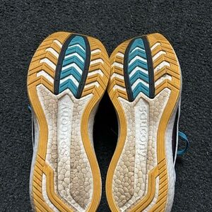 Saucony Endorphin Pro with Teal and Gold Soles